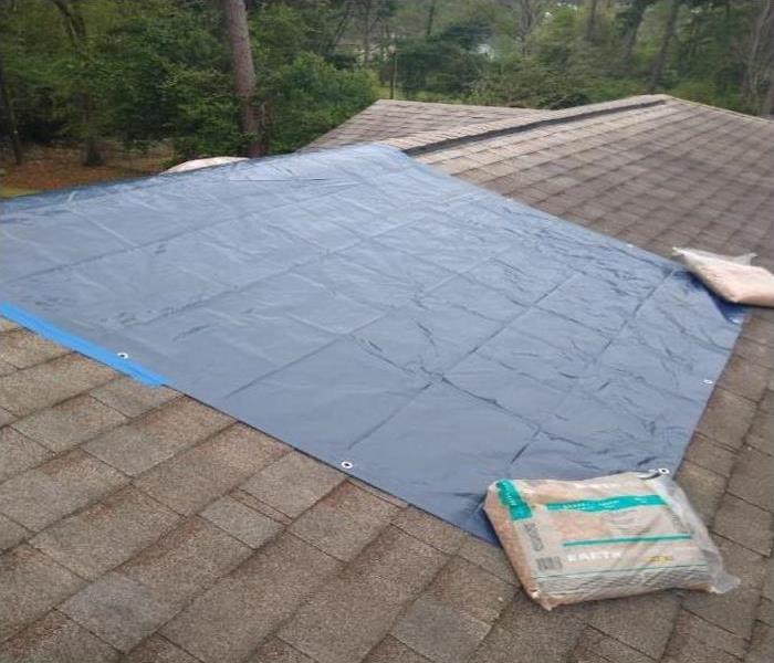 roof after being tarped