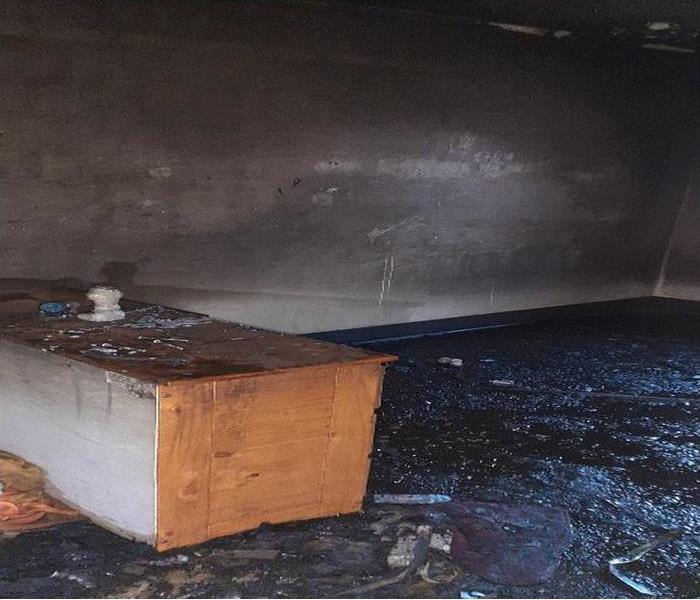 fire and soot damage to apartment bedroom