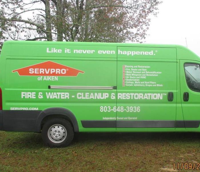We're Hiring!! Image of green SERVPRO van.